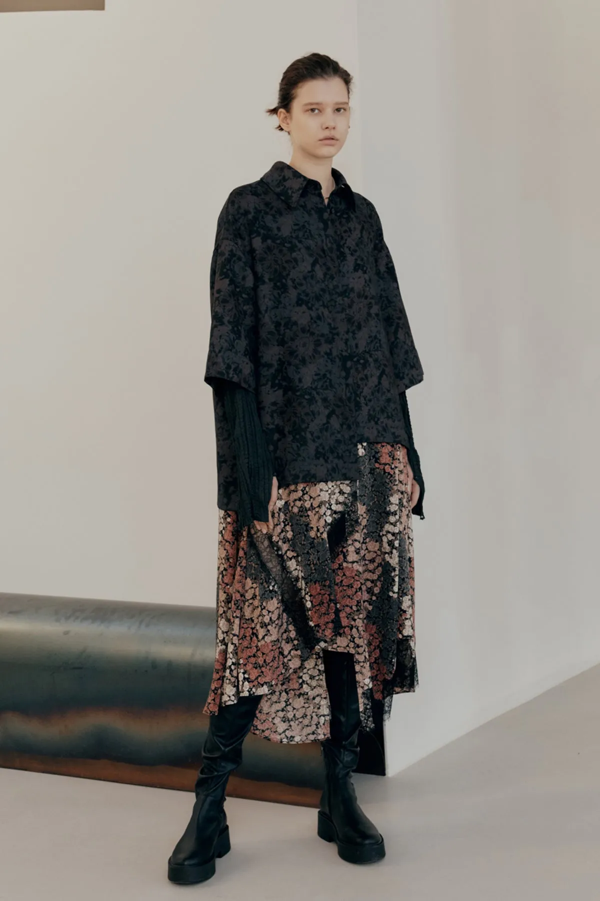 Oversized floral-print shirts layered with lace-trimmed skirt